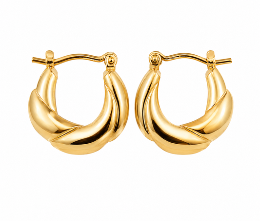 Pair of gold hoop earrings on a white background