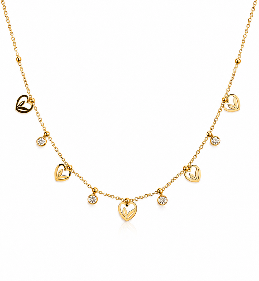 Gold necklace with heart-shaped pendants on a white background