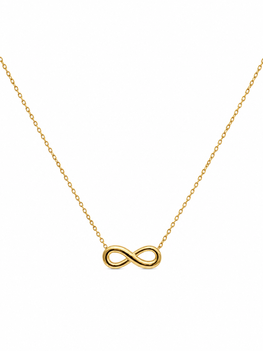 Gold infinity symbol pendant necklace on delicate cable chain