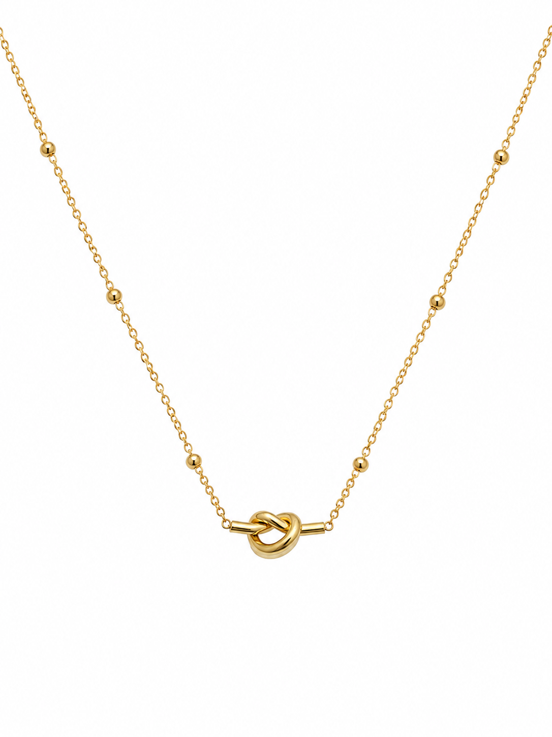 Gold love knot pendant necklace on satellite chain with gold bead accents