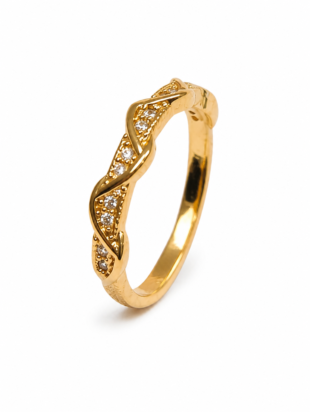 Gold ring with diamond accents on a white background