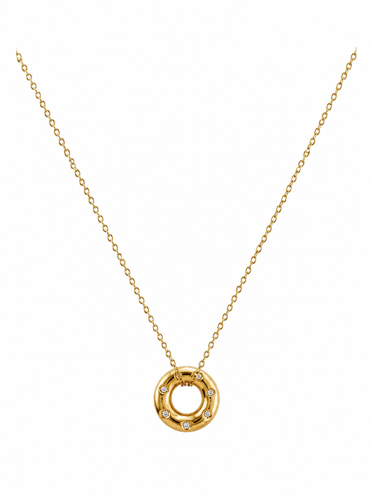 Gold necklace with a circular pendant on a white background