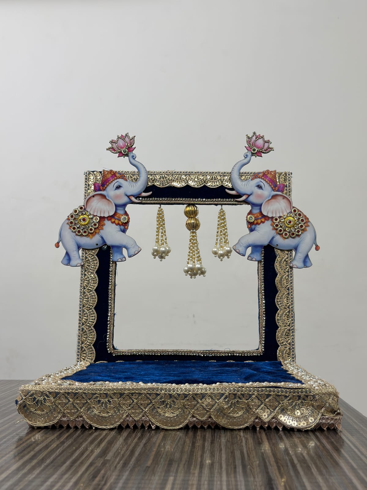 Handmade Singhasan for Laddu Gopal and Ganesh Ji with twin elephant figurines, navy blue velvet, silver zari border and pearl hangings