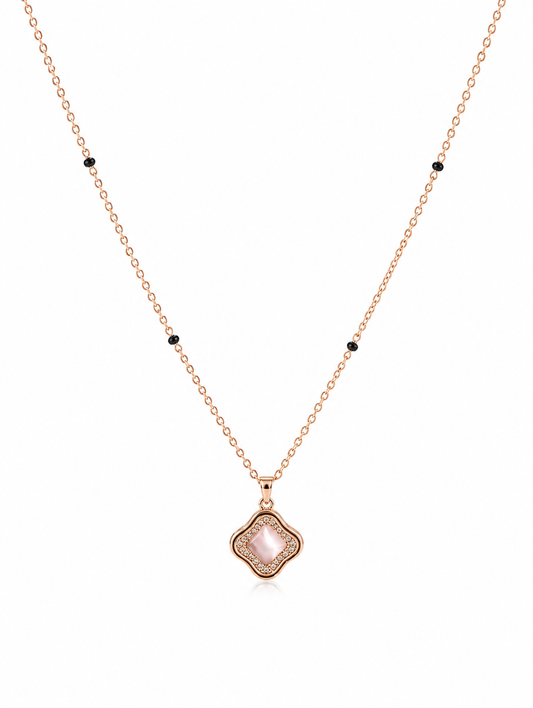 Necklace with a pink pendant on a white background