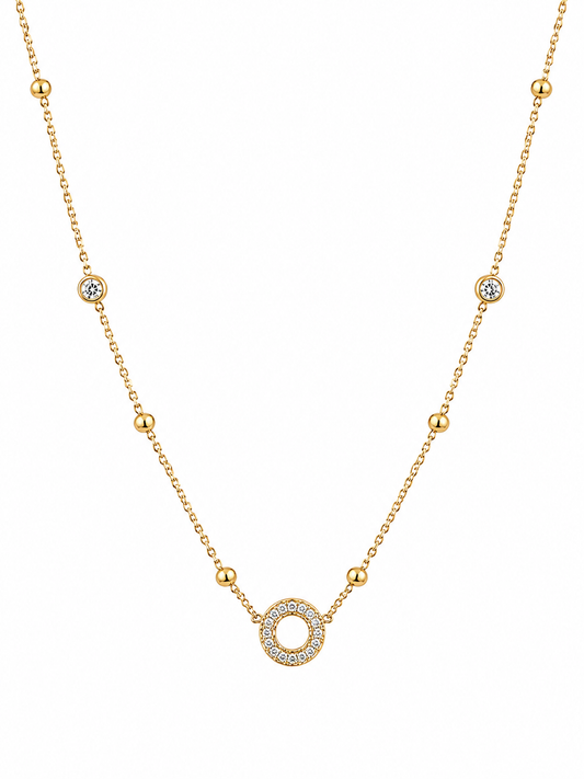 gold circle with diamonds pendent with white background
